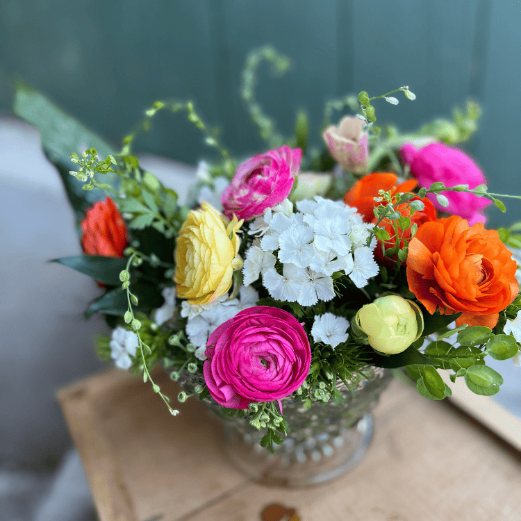 romantic colored floral delivery with green background